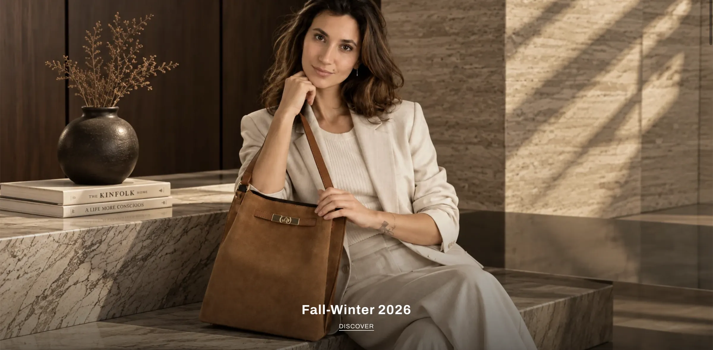 Atelier Bellariva — Seasonal collection homepage with full-width handbag campaign photography.